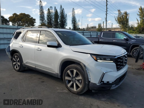 2024 Honda Pilot Touring с VIN 5FNYG2H76RB008887, выставлен на аукционе Copart как лот 46479745 с пробегом 12 947 миль миль и Списание • Salvage title. История ставок и продаж доступна на DreamBid. Изображение 4.