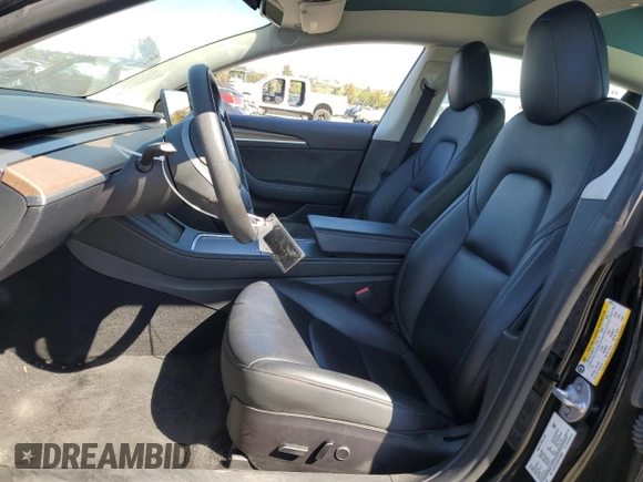 2023 Tesla Model 3 z VIN 5YJ3E1EA2PF449956, wystawiony jako Copart lot #64069715 z przebiegiem 40 098 mil mil oraz Szkoda całkowita • Salvage title. Historia ofert i sprzedaży dostępna na DreamBid. Obrazek 7.