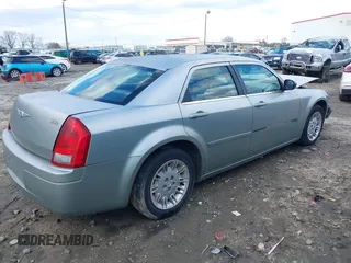 2005 Chrysler 300 with VIN 2C3JA43R05H137403, listed as a IAAI auction lot 41399519 with 135,044 mi miles. Bid and sale history available at carsss.com. Image 4.