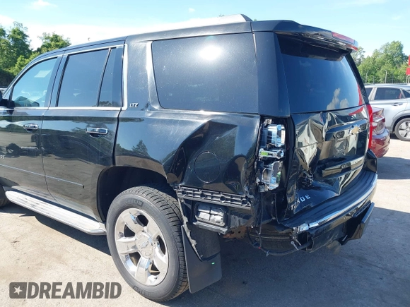 2015 Chevrolet Tahoe LTZ z VIN 1GNSKCKC3FR104845, wystawiony jako IAAI lot #42291785 z przebiegiem 75 047 mil mil oraz . Historia ofert i sprzedaży dostępna na DreamBid. Obrazek 6.