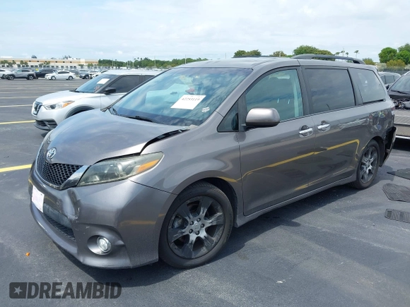 2015 Toyota Sienna SE with VIN 5TDXK3DC2FS552698, listed as a IAAI auction lot 42253119 with 110,710 mi miles and . Bid and sale history available at DreamBid. Image 2.