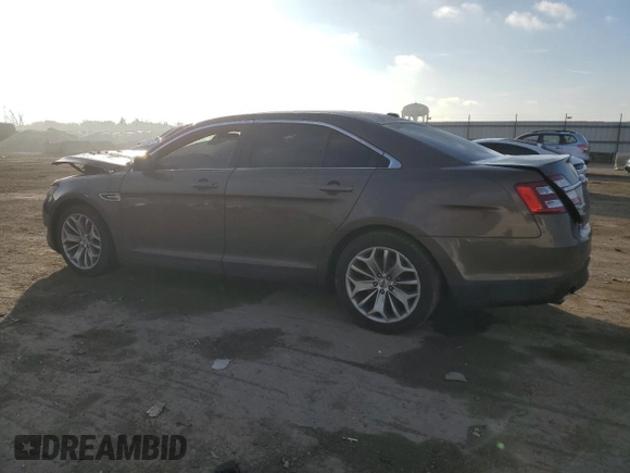 2015 Ford Taurus Limited with VIN 1FAHP2J84FG105497, listed as a Copart auction lot 85284804 with Not Provided miles and Salvage Title. Bid and sale history available at carsss.com. Image 2.