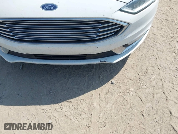 2017 Ford Fusion Titanium with VIN 3FA6P0K90HR168031, listed as a IAAI auction lot 42578926 with 210,268 mi miles and . Bid and sale history available at DreamBid. Image 6.