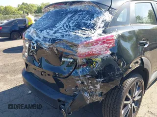 2018 Mazda CX-3 Touring z VIN JM1DKFC73J0321605, wystawiony jako IAAI lot #42355269 z przebiegiem 40 053 mil mil oraz . Historia ofert i sprzedaży dostępna na DreamBid. Obrazek 6.