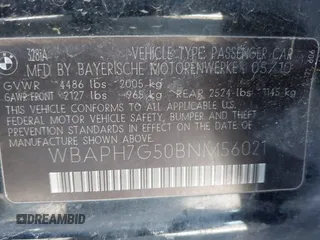 2011 BMW 3 Series 328i with VIN WBAPH7G50BNM56021, listed as a IAAI auction lot 42006563 with 178,919 mi miles. Bid and sale history available at carsss.com. Image 9.
