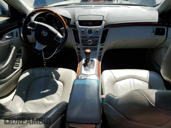 2009 Cadillac CTS AWD with VIN 1G6DH577390123365, listed as a Copart auction lot 54815885 with 141,026 mi miles and Salvage Title. Bid and sale history available at DreamBid. Image 8.