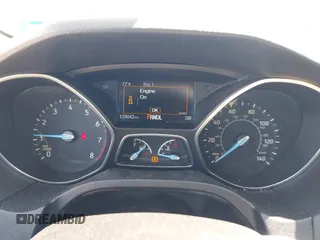2016 Ford Focus SE with VIN 1FADP3F2XGL205797, listed as a IAAI auction lot 41987209 with 129,042 mi miles. Bid and sale history available at carsss.com. Image 7.