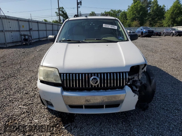 2007 Mercury Mariner Premier with VIN 4M2CU97107KJ12925, listed as a Copart auction lot 62371895 with 141,576 mi miles and Salvage title. Bid and sale history available at DreamBid. Image 5.