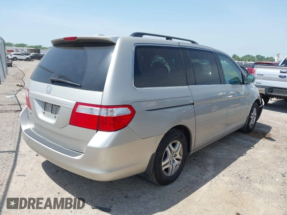 2007 Honda Odyssey EX-L with VIN 5FNRL38757B431334, listed as a IAAI auction lot 42026018 with 135,898 mi miles. Bid and sale history available at carsss.com. Image 4.