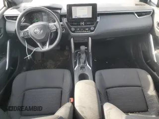 2023 Toyota Corolla Cross Hybrid S with VIN 7MUFBABG4PV004988, listed as a Copart auction lot 62098725 with 11,874 mi miles and Salvage title. Bid and sale history available at DreamBid. Image 8.