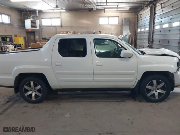 2014 Honda Ridgeline SE with VIN 5FPYK1F6XEB010582, listed as a IAAI auction lot 41641803 with 69,923 mi miles. Bid and sale history available at carsss.com. Image 13.