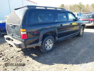 2004 Chevrolet Suburban Z71 with VIN 3GNFK16Z94G128052, listed as a IAAI auction lot 41616545 with 302,271 mi miles. Bid and sale history available at carsss.com. Image 4.