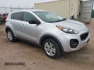 2017 Kia Sportage LX z VIN KNDPMCAC7H7055707, wystawiony jako IAAI lot #42350889 z przebiegiem 140 650 mil mil oraz . Historia ofert i sprzedaży dostępna na DreamBid. Obrazek 1.