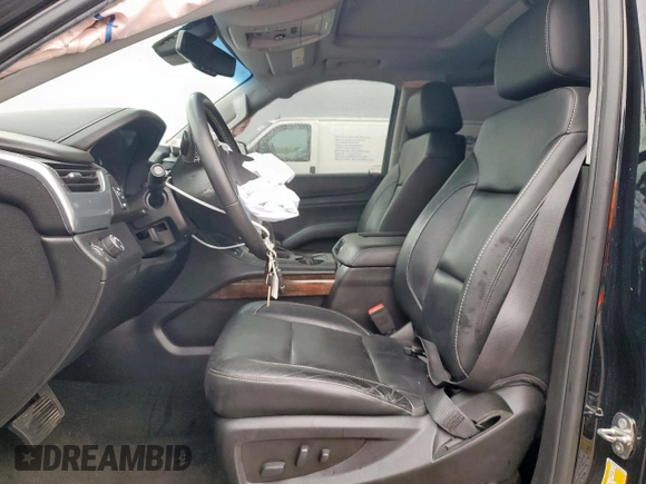 2018 Chevrolet Tahoe LT with VIN 1GNSCBKC3JR351640, listed as a Copart auction lot 50493995 with 135,603 mi miles and Salvage title. Bid and sale history available at DreamBid. Image 7.