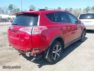 2016 Toyota RAV4 XLE with VIN JTMWFREV6GJ099056, listed as a IAAI auction lot 41941541 with 137,154 mi miles. Bid and sale history available at carsss.com. Image 4.