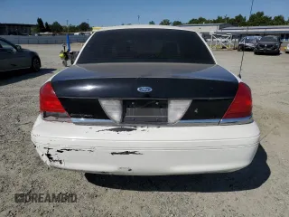 2005 Ford Police Interceptor z VIN 2FAFP71W95X144873, wystawiony jako Copart lot #58260905 z przebiegiem 135 986 mil mil oraz Szkoda całkowita • Salvage title. Historia ofert i sprzedaży dostępna na DreamBid. Obrazek 6.