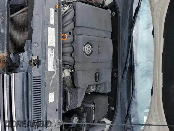 2013 Volkswagen Passat SE z VIN 1VWBH7A36DC086841, wystawiony jako Copart lot #60202355 z przebiegiem 147 359 mil mil oraz Szkoda całkowita • Salvage title. Historia ofert i sprzedaży dostępna na DreamBid. Obrazek 11.