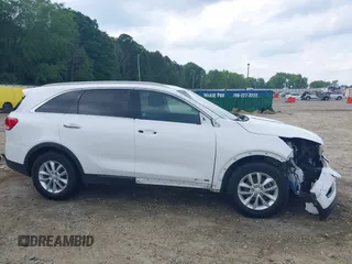 2017 Kia Sorento LX z VIN 5XYPGDA57HG197895, wystawiony jako IAAI lot #42265132 z przebiegiem 100 154 mil mil oraz . Historia ofert i sprzedaży dostępna na DreamBid. Obrazek 14.