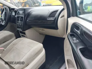 2012 Dodge Grand Caravan SXT with VIN 2C4RDGCG3CR308173, listed as a IAAI auction lot 42255879 with 96,489 mi miles and . Bid and sale history available at DreamBid. Image 5.
