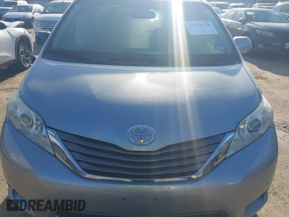 2014 Toyota Sienna XLE with VIN 5TDYK3DC8ES423450, listed as a IAAI auction lot 41972128 with 145,374 mi miles. Bid and sale history available at carsss.com. Image 12.