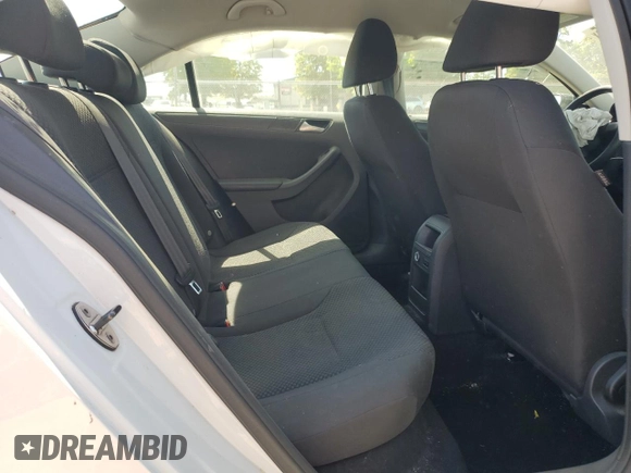 2014 Volkswagen Jetta S with VIN 3VW2K7AJ2EM303673, listed as a Copart auction lot 62909235 with 69,592 mi miles and Salvage title. Bid and sale history available at DreamBid. Image 10.