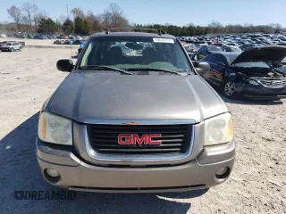 2005 GMC Envoy SLE с VIN 1GKDS13S852264341, выставлен на аукционе Copart как лот 49835015 с пробегом 178 401 миль миль и Списание • Salvage title. История ставок и продаж доступна на DreamBid. Изображение 5.