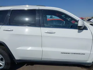2014 Jeep Grand Cherokee Laredo with VIN 1C4RJEAG3EC125478, listed as a IAAI auction lot 41938499 with 167,588 mi miles and . Bid and sale history available at DreamBid. Image 13.