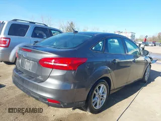 2016 Ford Focus SE with VIN 1FADP3F26GL233564, listed as a IAAI auction lot 42083597 with 153,404 mi miles and . Bid and sale history available at DreamBid. Image 4.