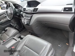 2013 Honda Odyssey Touring with VIN 5FNRL5H96DB074819, listed as a IAAI auction lot 41898358 with 123,428 mi miles and . Bid and sale history available at carsss.com. Image 5.