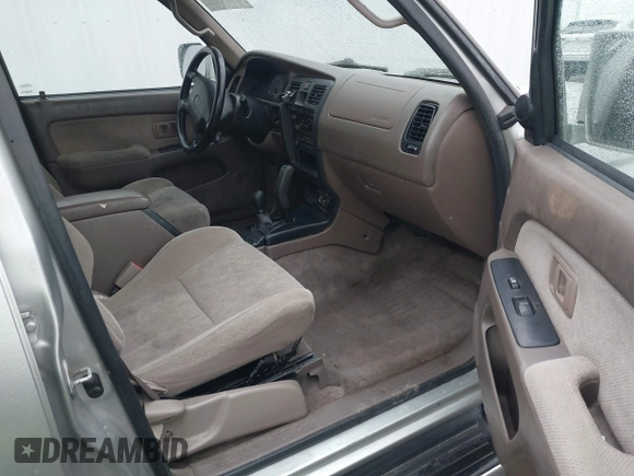 1999 Toyota 4Runner SR5 with VIN JT3HN86RXX0232435, listed as a IAAI auction lot 41473618 with 267,054 mi miles and . Bid and sale history available at DreamBid. Image 5.