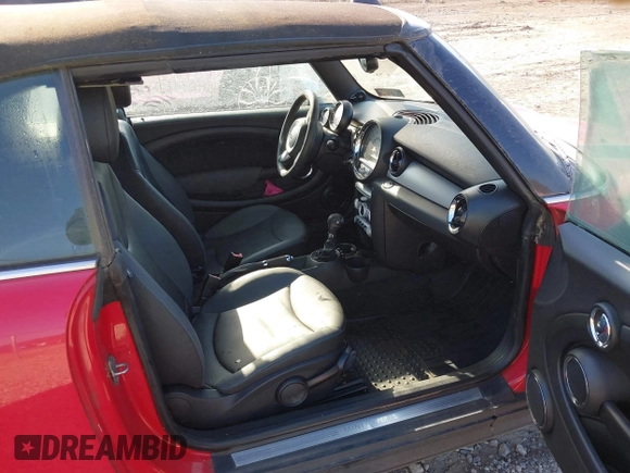 2010 MINI Convertible with VIN WMWMR3C59ATU97398, listed as a IAAI auction lot 41714054 with 12,663 mi miles and . Bid and sale history available at DreamBid. Image 5.