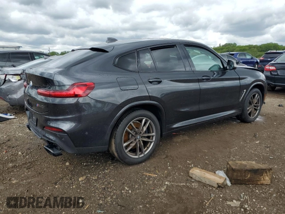 2021 BMW X4 M40i z VIN 5UX2V5C0XM9F04867, wystawiony jako Copart lot #57890555 z przebiegiem 40 563 mil mil oraz Szkoda całkowita • Salvage title. Historia ofert i sprzedaży dostępna na DreamBid. Obrazek 3.