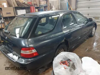 1997 Honda Accord with VIN 1HGCE1720VA005911, listed as a IAAI auction lot 41730124 with 239,883 mi miles and . Bid and sale history available at DreamBid. Image 4.