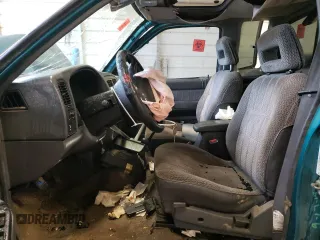 1997 Nissan Frontier XE with VIN 1N6SD16Y2VC338776, listed as a Copart auction lot 45020595 with 243,030 mi miles and Salvage title. Bid and sale history available at DreamBid. Image 7.