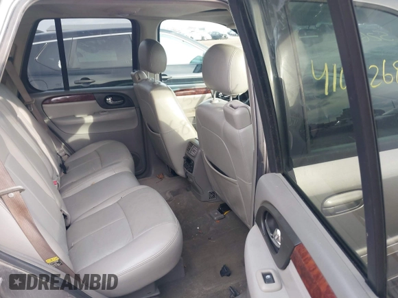 2005 GMC Envoy SLT with VIN 1GKDT13S752276414, listed as a IAAI auction lot 41052684 with 200,919 mi miles. Bid and sale history available at carsss.com. Image 8.