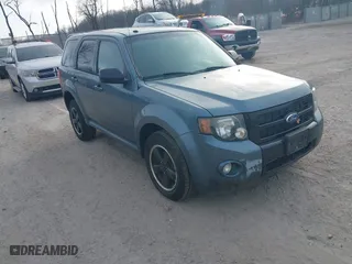 2011 Ford Escape XLT with VIN 1FMCU9DG9BKC38929, listed as a IAAI auction lot 41784854 with 216,201 mi miles. Bid and sale history available at carsss.com. Image 1.