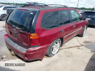 2006 GMC Envoy SLE z VIN 1GKDS13S362314323, wystawiony jako IAAI lot #42476958 z przebiegiem 164 322 mil mil oraz . Historia ofert i sprzedaży dostępna na DreamBid. Obrazek 4.
