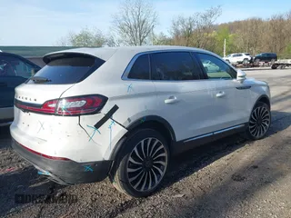 2023 Lincoln Nautilus Black Label z VIN 2LMPJ9JP1PBL28970, wystawiony jako IAAI lot #42091191 z przebiegiem 15 276 mil mil oraz . Historia ofert i sprzedaży dostępna na DreamBid. Obrazek 4.