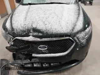 2013 Ford Taurus SHO z VIN 1FAHP2KT8DG142620, wystawiony jako IAAI lot #41800583 z przebiegiem 175 812 mil mil oraz . Historia ofert i sprzedaży dostępna na DreamBid. Obrazek 13.