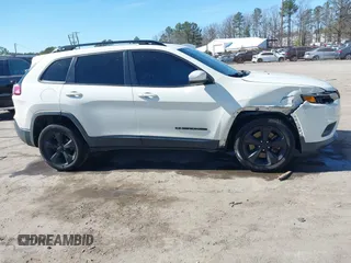 2019 Jeep Cherokee Latitude Plus with VIN 1C4PJLLB2KD296144, listed as a IAAI auction lot 41681051 with 199,698 mi miles and . Bid and sale history available at DreamBid. Image 13.