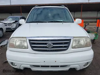 2001 Suzuki Grand Vitara JLX with VIN JS3TD62V114157738, listed as a IAAI auction lot 41721813 with 134,661 mi miles. Bid and sale history available at carsss.com. Image 6.