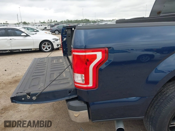 2015 Ford F-150 XL with VIN 1FTEW1CG9FKE02714, listed as a IAAI auction lot 42006913 with 151,809 mi miles. Bid and sale history available at carsss.com. Image 17.