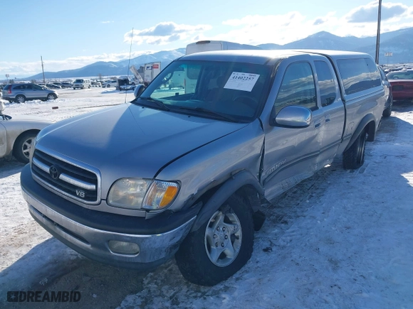 2002 Toyota Tundra SR5 with VIN 5TBBT44192S225410, listed as a IAAI auction lot 41402257 with 218,842 mi miles. Bid and sale history available at carsss.com. Image 6.