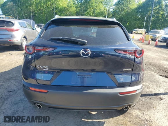 2022 Mazda CX-30 S Select z VIN 3MVDMBBL6NM429624, wystawiony jako Copart lot #57426795 z przebiegiem 48 412 mil mil oraz Szkoda całkowita • Salvage title. Historia ofert i sprzedaży dostępna na DreamBid. Obrazek 6.