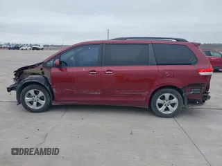 2014 Toyota Sienna LE AAS with VIN 5TDKK3DC6ES487962, listed as a IAAI auction lot 41568458 with 164,043 mi miles. Bid and sale history available at carsss.com. Image 14.