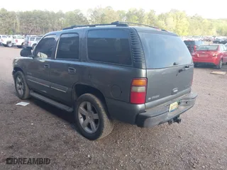 2002 Chevrolet Tahoe LT with VIN 1GNEC13Z92R273473, listed as a IAAI auction lot 41841071 with 290,007 mi miles. Bid and sale history available at carsss.com. Image 3.