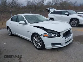 2015 Jaguar XF V6 Portfolio with VIN SAJWA0F7XF8U88039, listed as a IAAI auction lot 41459904 with 83,927 mi miles. Bid and sale history available at carsss.com. Image 1.