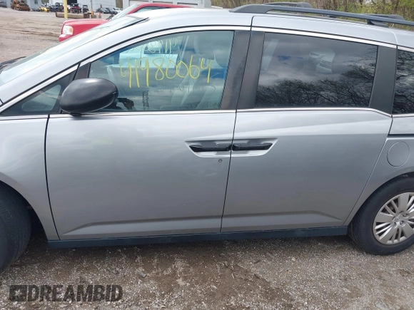 2016 Honda Odyssey LX with VIN 5FNRL5H23GB028338, listed as a IAAI auction lot 41980064 with 186,403 mi miles and . Bid and sale history available at DreamBid. Image 14.