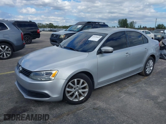 2012 Volkswagen Jetta Sedan SE w/Convenience PZEV with VIN 3VWDP7AJ5CM348310, listed as a IAAI auction lot 41439669 with 166,554 mi miles. Bid and sale history available at carsss.com. Image 2.