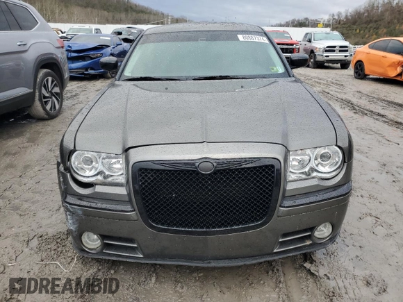 2009 Chrysler 300 with VIN 2C3KA63T39H618506, listed as a Copart auction lot 80887374 with 74,640 mi miles and Salvage Title. Bid and sale history available at carsss.com. Image 5.